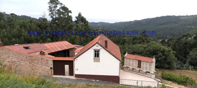 CASA DE PIEDRA CON TERRENO