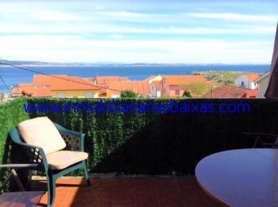 APARTAMENTO CON TERRAZA Y VISTAS AL MAR EN CORRUBEDO