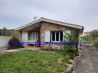 CASA CON TERRENO EN AGUIÑO